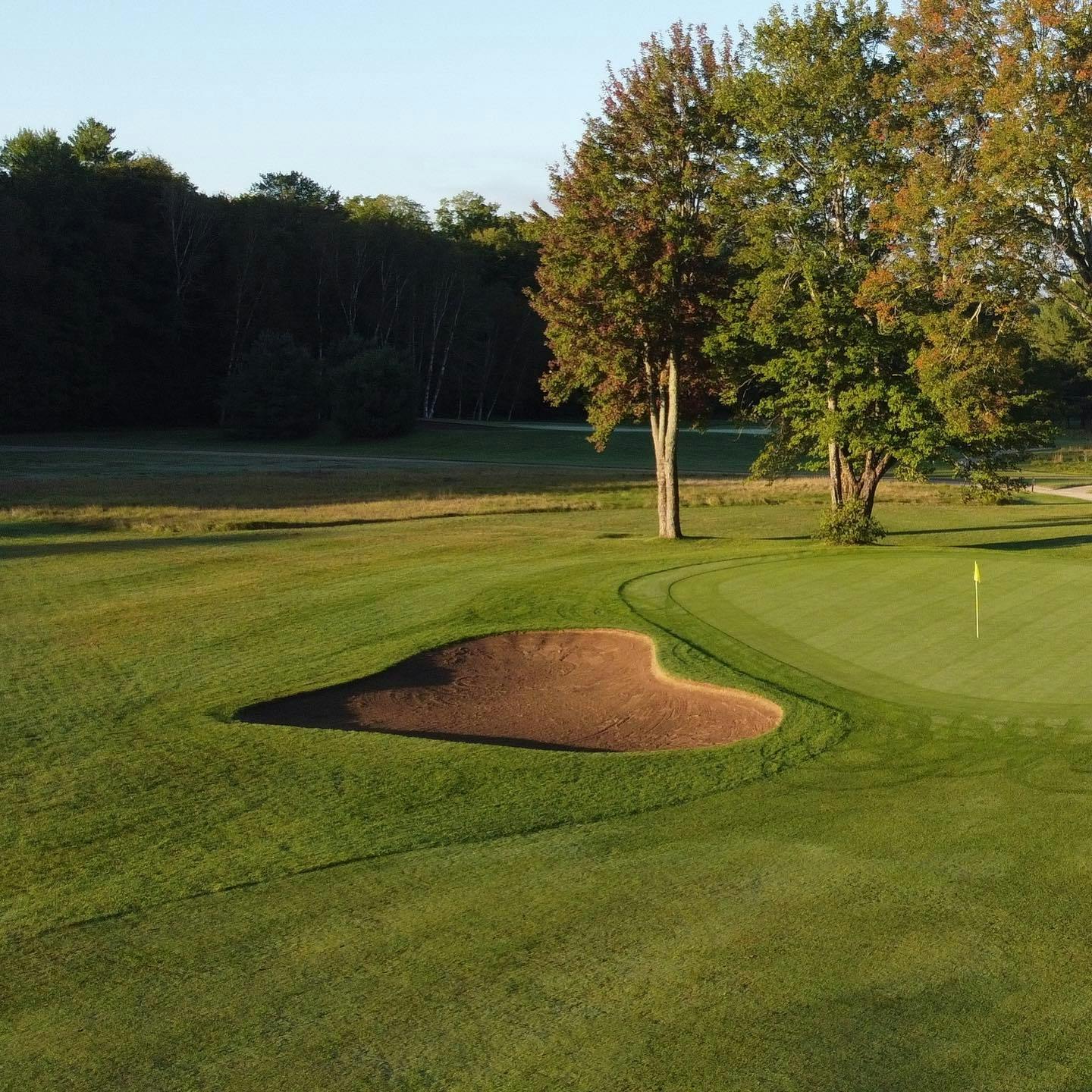 Originally beside the fairway bunker, 9 north green underwent a big move in 1968—125 yards back to its current spot. Kudos to architect Robbie Robinson for the new green, which was built as part of the south course construction. Pre-1968, it played as a 365-yard par 4 with a small square green. This hole was actually our opening hole for the first two years while the clubhouse was being built in the early 1950s. The original clubhouse was a small log cabin beside the yellow tees on 9. #LSGHistory #PlayTheLake